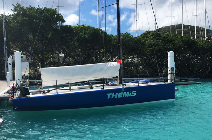 A sailboat docked in Nanny Cay Marina